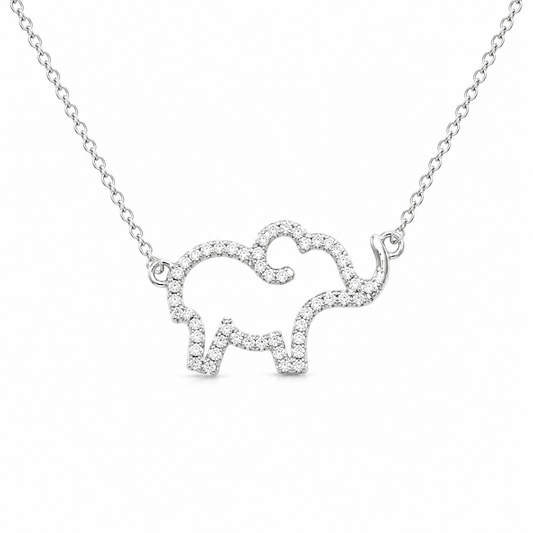 A silver-toned necklace featuring an elephant-shaped pendant paved with small clear stones, shown against a plain white background.