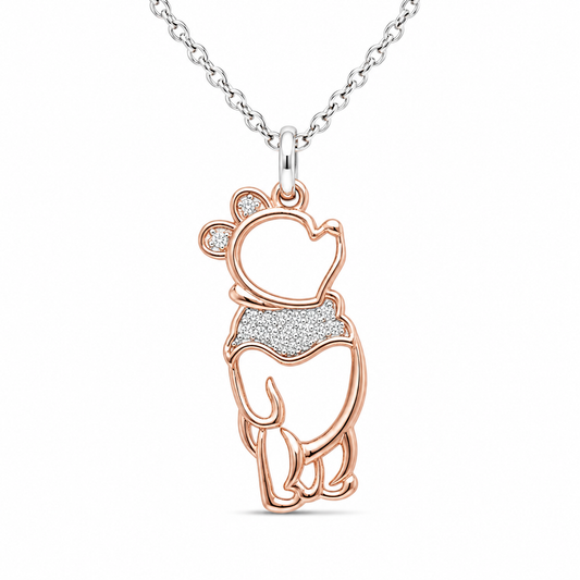A silver chain necklace with a rose gold outline pendant of Winnie the Pooh, featuring a textured pavé diamond chest and ear details, shown on a white background.