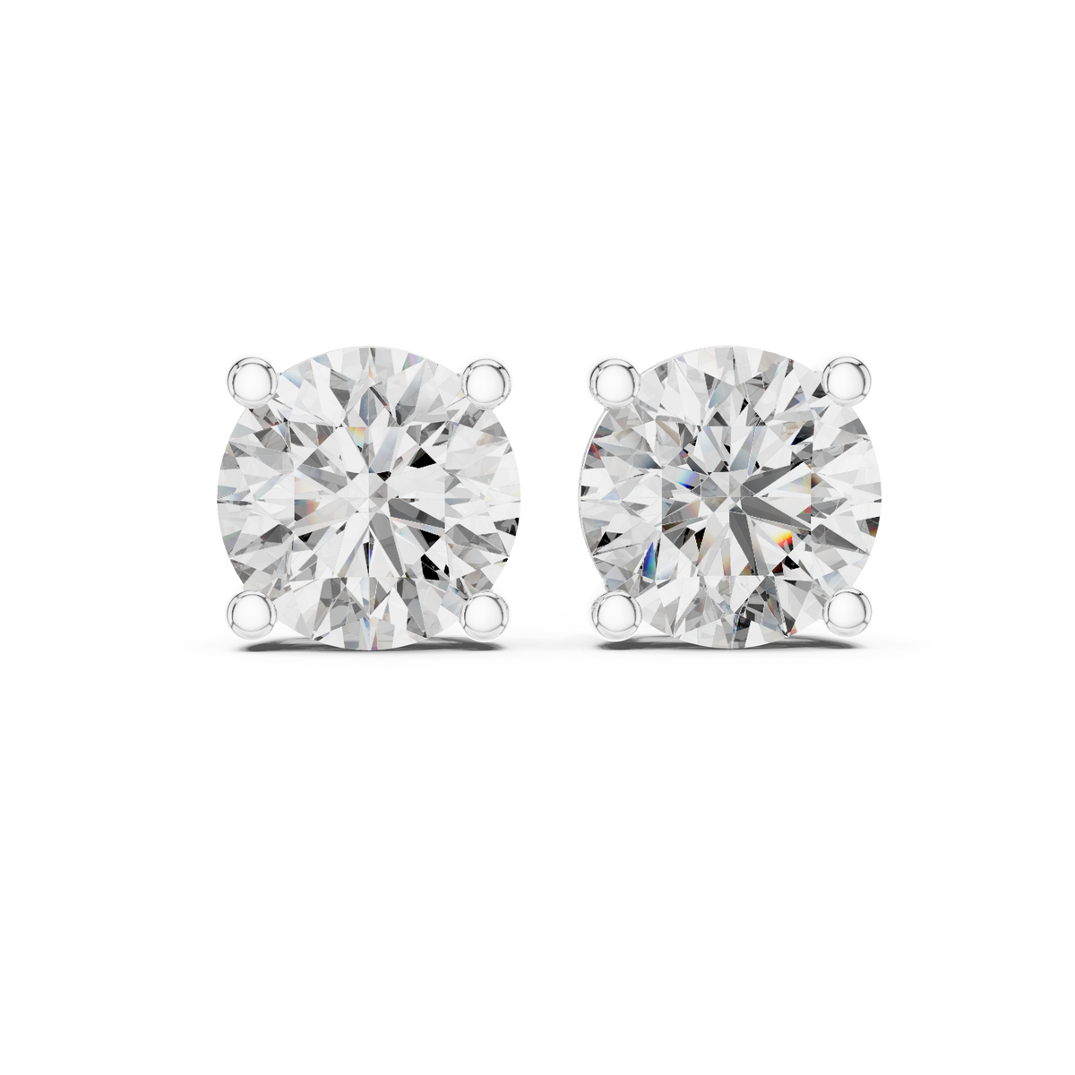 Pair of diamond stud earrings on a white background