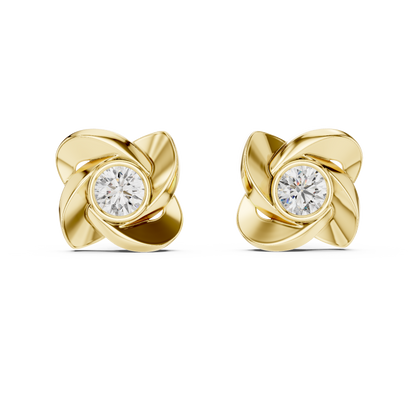 Gold earrings with diamond centers on a white background