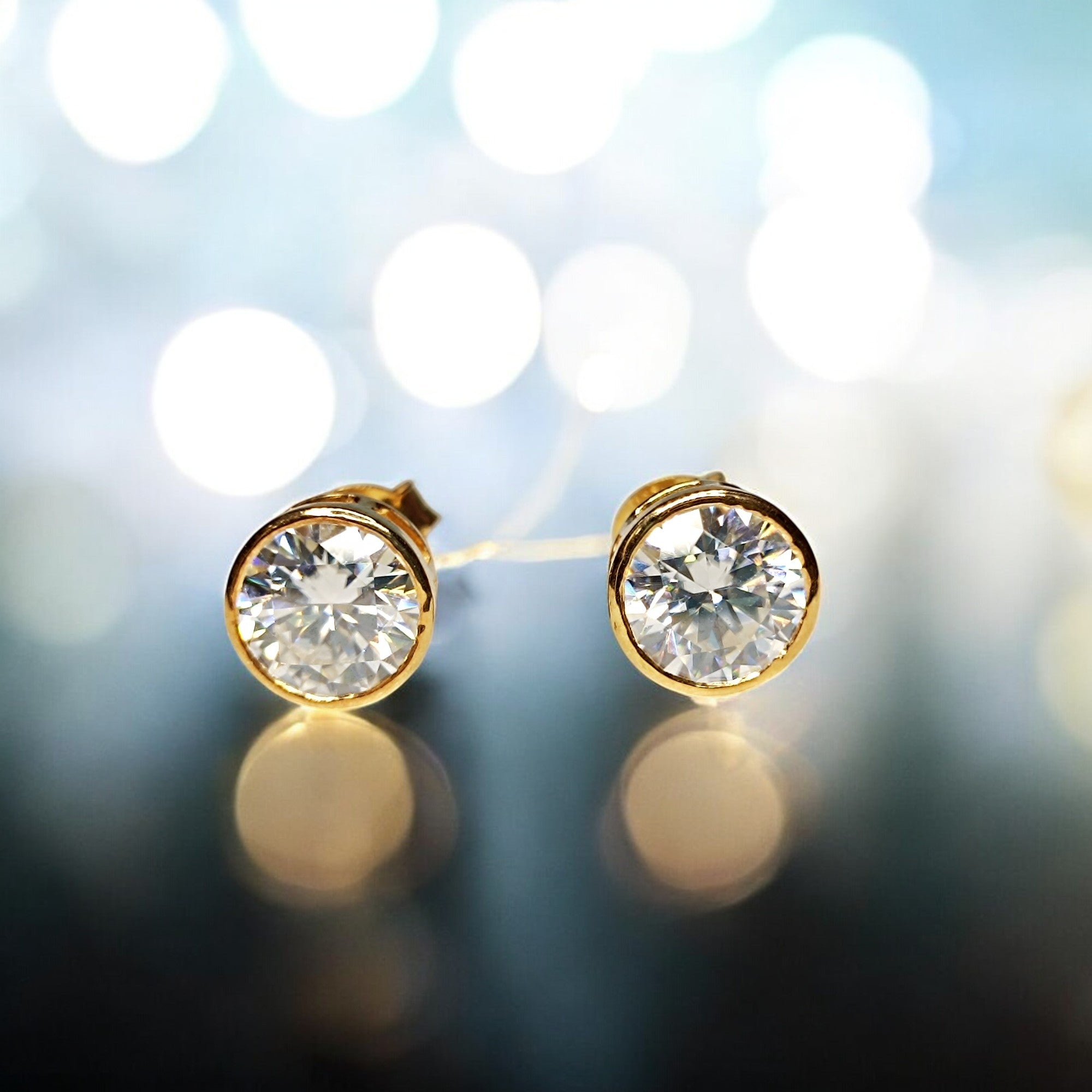 RKC 2 Carat Round Cut Moissanite Women's Stud Earrings 14k Yellow Gold Plated 925 Silver Weight 2mm